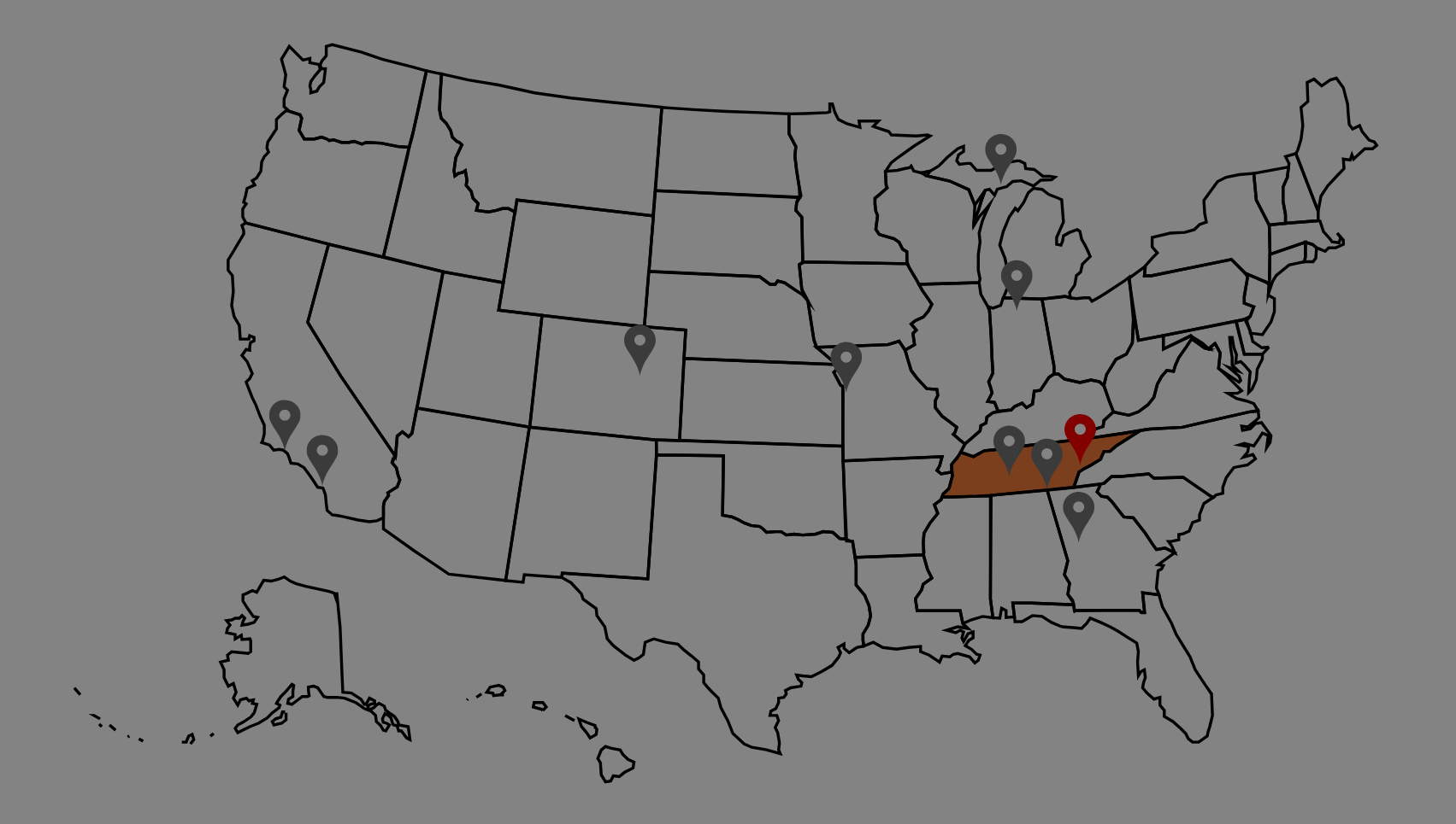 Map of the United States with Tennessee highlighted in red on a gray background