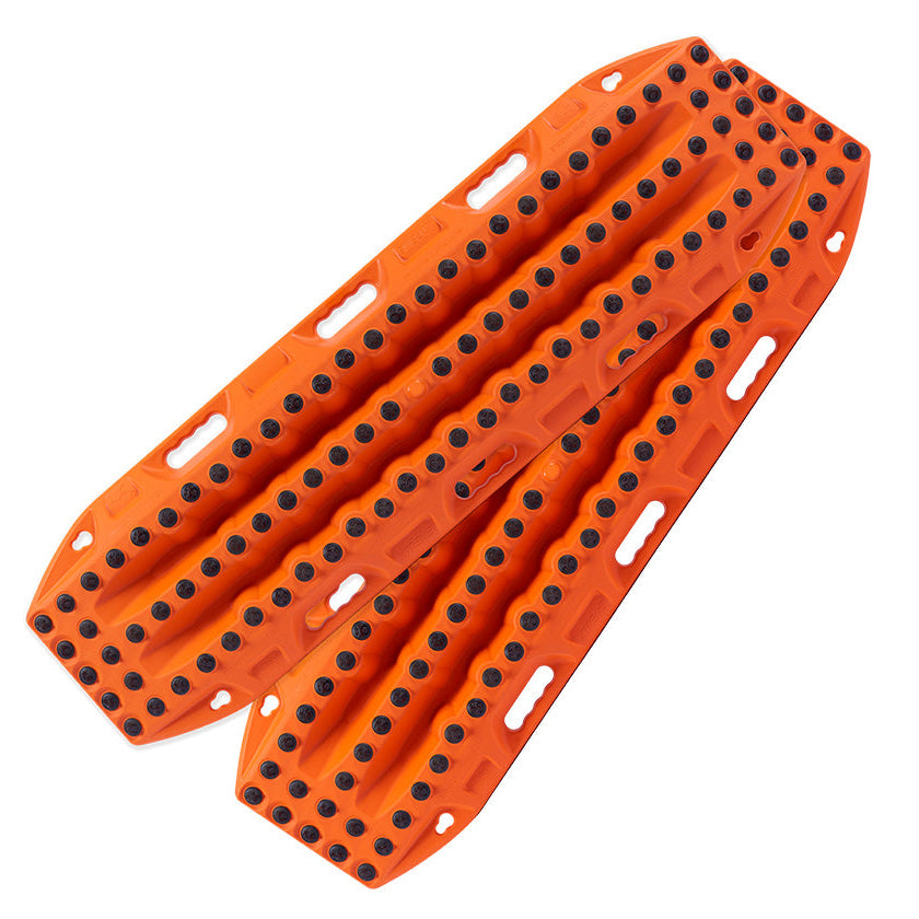 Orange plastic straps with black dots on a white background