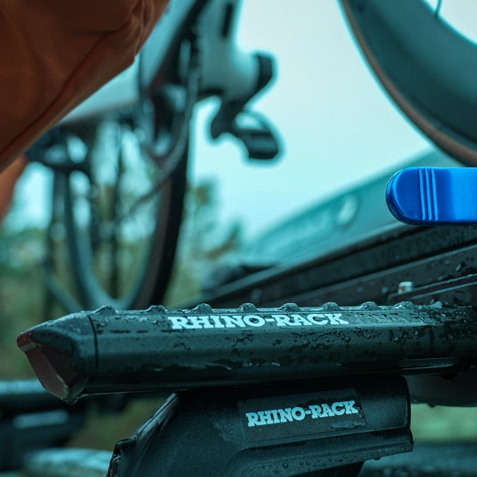 Close-up of a Rhino-Rack bike rack with blurred background